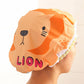 Lion cartoon shower bath cap with elastic ruffle trim, orange lion face design
