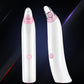 Two-piece blackhead suction device in white and pink, each with clear nozzle head
