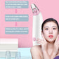 White and pink blackhead suction device held near face with clear nozzle head