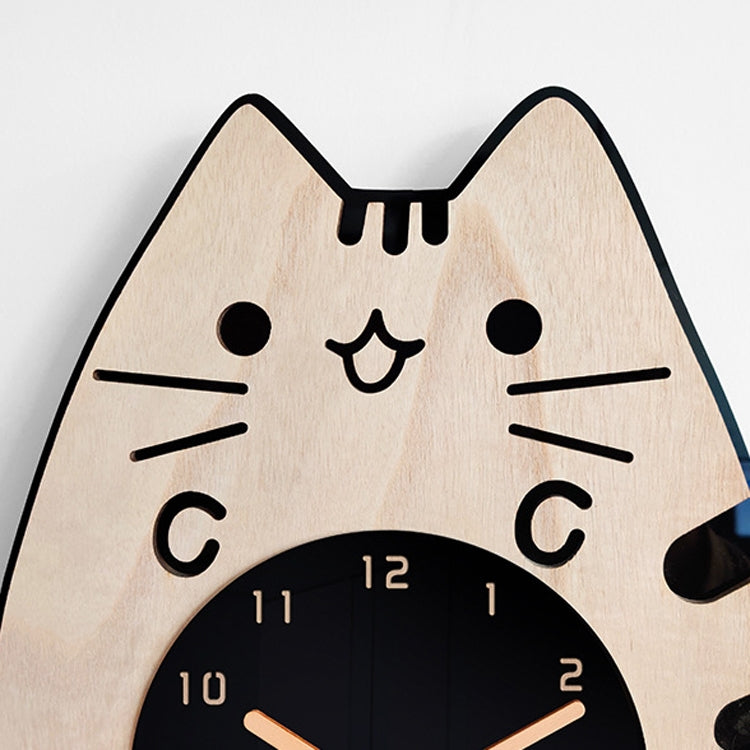 Close-up cat wooden wall clock face with black eyes, whiskers, and round black dial