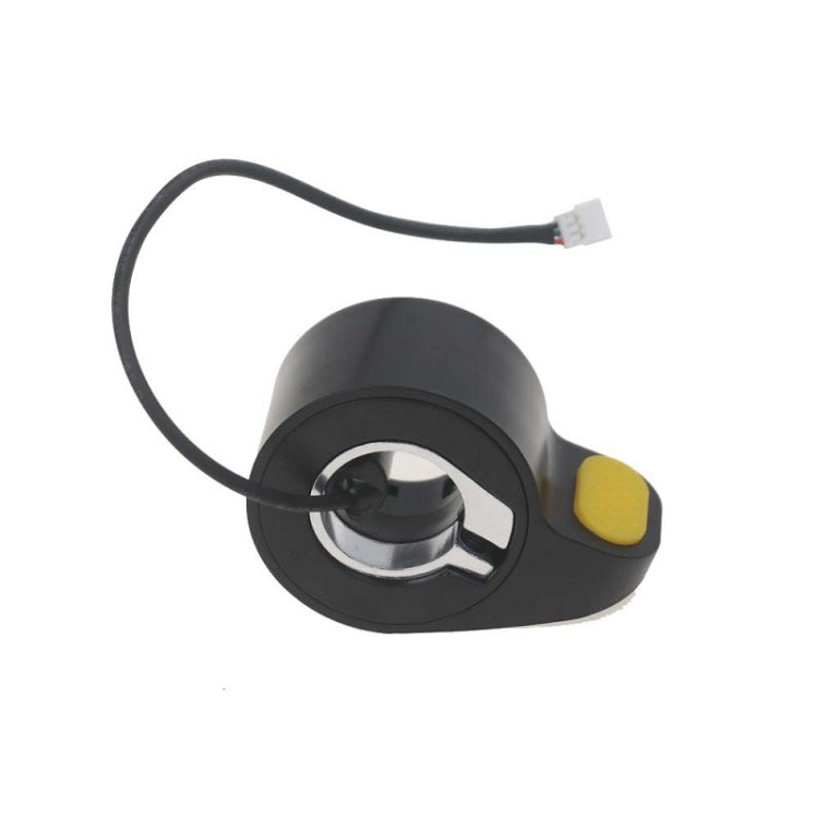 Thumb throttle accelerator with metal ring, yellow button, and wiring cable