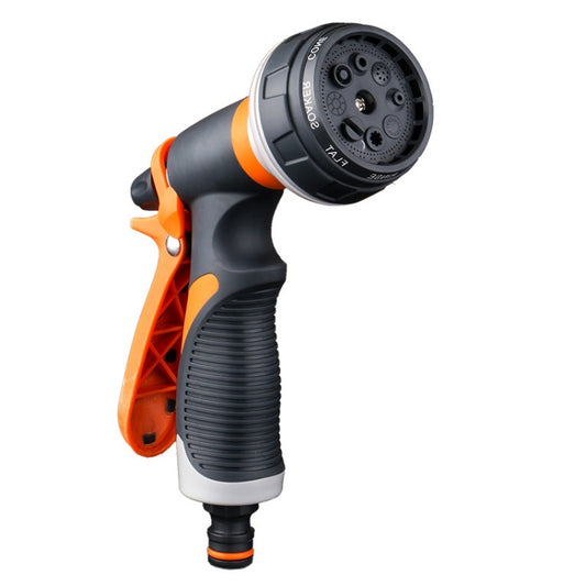 Orange plastic garden watering sprinkler with adjustable spray head and trigger handle