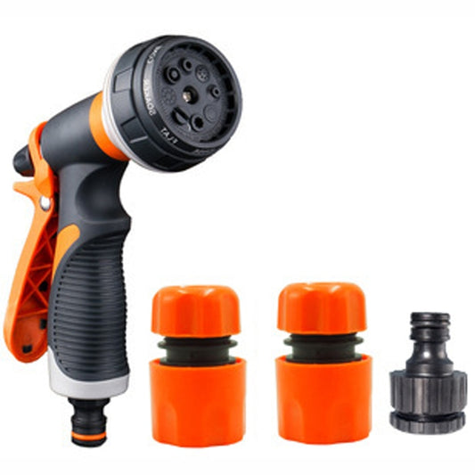Orange garden sprinkler with spray head plus orange adapters and black connector piece