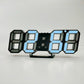 3D LED alarm clock with blue illuminated 3D digits on black frame