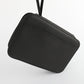 Black fabric sewing kit pouch with shoulder strap and zipper closure