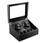 Carbon-finish watch winder storage box with hinged lid, open compartments