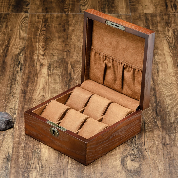 6-slot watch storage box with lid open, tan-lined interior with divided compartments for watches