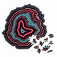 Wooden jigsaw puzzle with multicolor agate-style pattern and scattered puzzle pieces