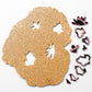 Wooden jigsaw puzzle with tan agate-style pattern and scattered puzzle pieces
