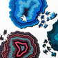 Wooden jigsaw puzzle with blue and multicolor agate patterns plus loose pieces