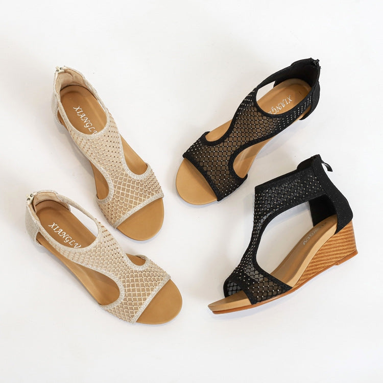Pair of black and beige mesh wedge sandals with peep toe and adjustable ankle straps