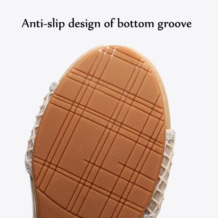 Beige wedge sandal outsole with textured anti-slip tread pattern