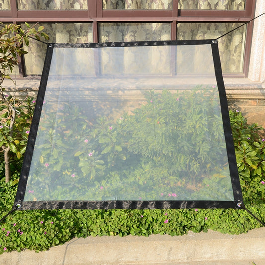 Transparent rainproof film panel with black border and eyelets for plant/window cover