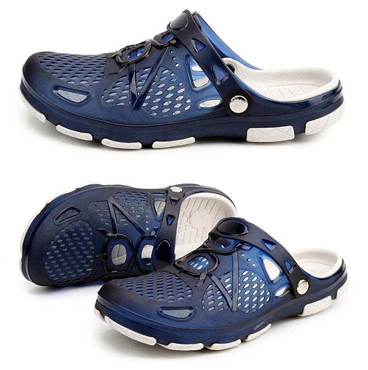 Navy slip-on sandals/clogs with perforations, adjustable straps, and cushioned sole