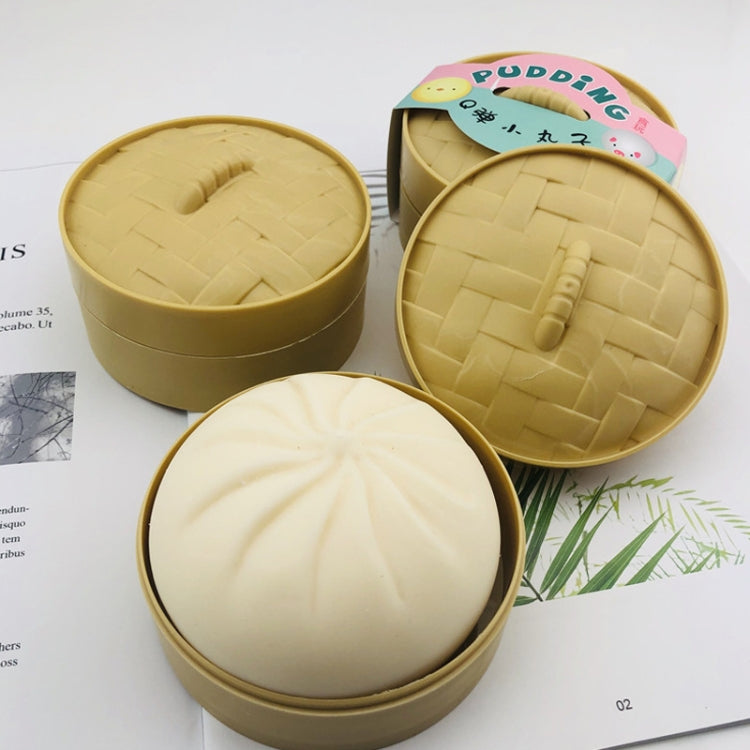 Squishy bun toy set in round tins, cream and tan with swirl and braid textures