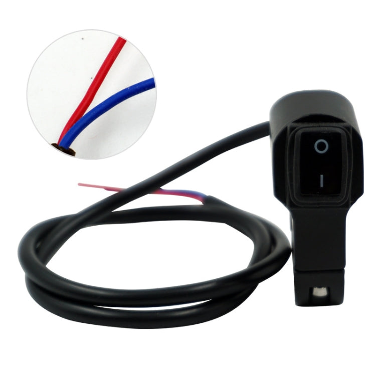 Black motorcycle headlight switch with attached wiring harness and rocker toggle