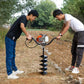 Ground drill extension rod mounted on auger bit for soil drilling