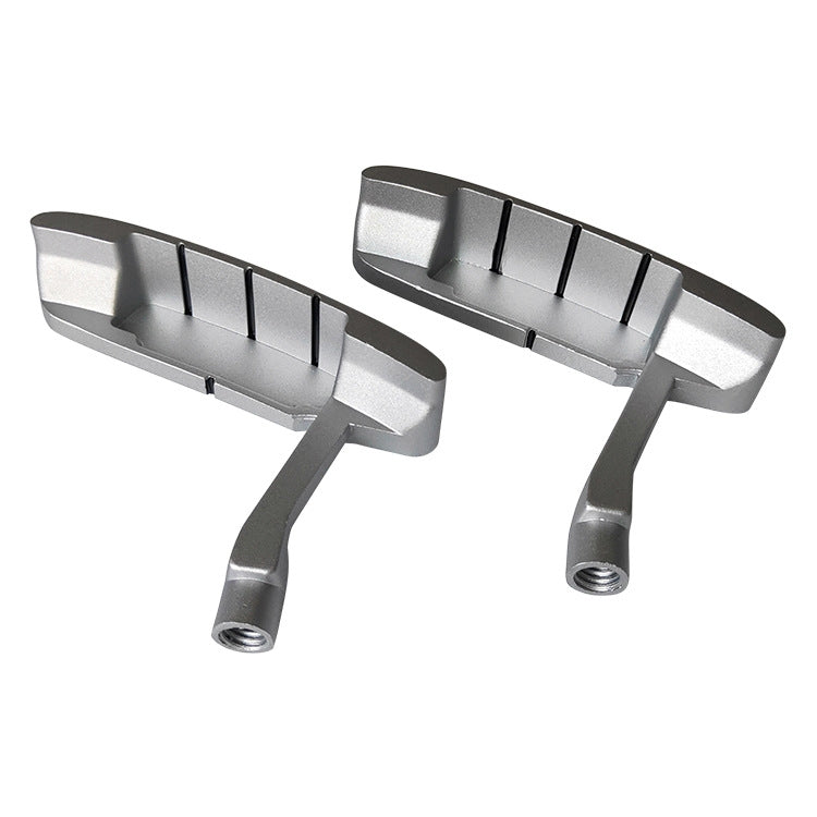 Children's zinc alloy practice putter head, underside view with alignment ridges