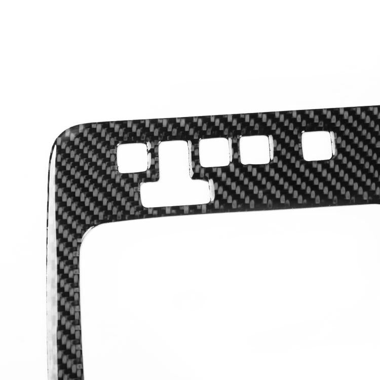 Black carbon fiber gear shift panel sticker with multiple small button cutouts
