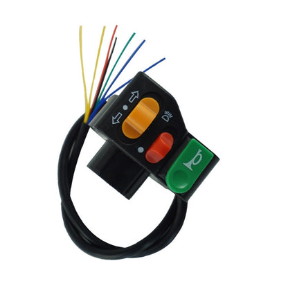 Motorcycle headlight switch housing with orange, red, and green push buttons