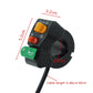 Motorcycle handlebar switch with orange, red, and green buttons and black cable