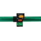 Motorcycle switch clamp with orange, red, and green buttons on a green bar mount