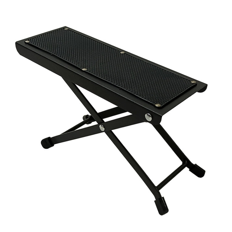Folding guitar pedal foot pad with textured platform and adjustable cross legs, black