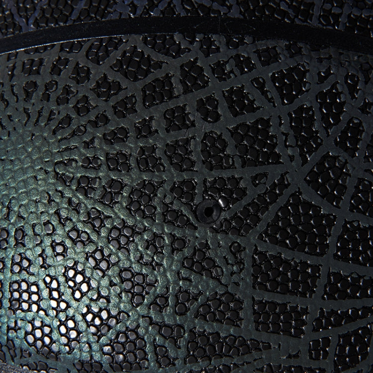 Close-up of dark basketball texture with small raised grip dots and web pattern