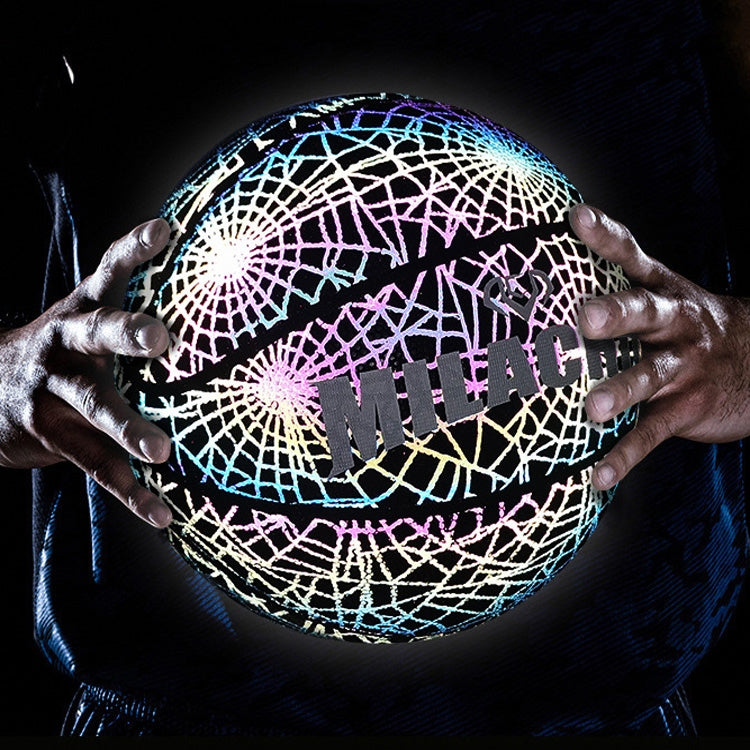 Reflective web basketball in hands, with white net lines and pink, blue, and purple glow