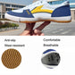Blue and yellow canvas sneakers with white laces and textured gum outsole, side view