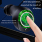 Black wireless earbud hearing aid with green glowing sensor ring and fingertip