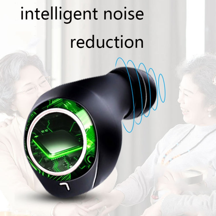 Black wireless earbud hearing aid with green light ring, held near seated older adults