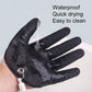 Dark charcoal anti-skid latex glove with water droplets on palm and fingers