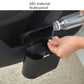 Car trash can with open side cup as bottle pours into the bin