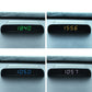 Car digital clock shows multiple times on the front display, dark housing