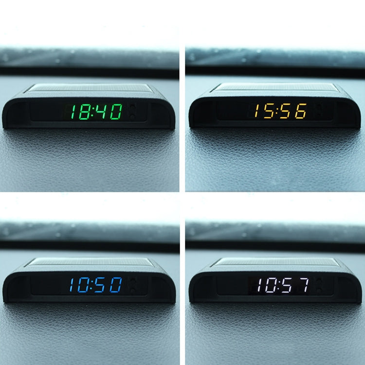 Car digital clock shows multiple times on the front display, dark housing