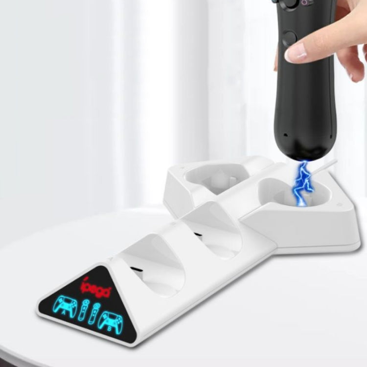 White charging cradle with a controller handle inserted and blue LED light