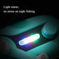 Turquoise bite alarm with bright LED light flash near the fishing rod