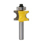 Yellow woodworking router bit with semicircular cutting profile on silver shank