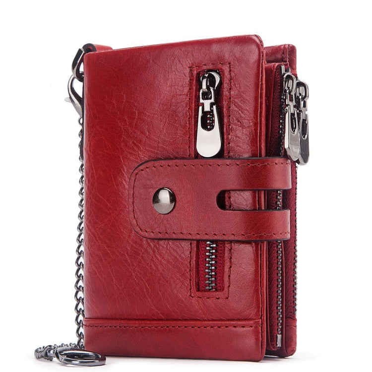 Red tri-fold leather wallet with chain strap, front belt tab, and zipper pocket
