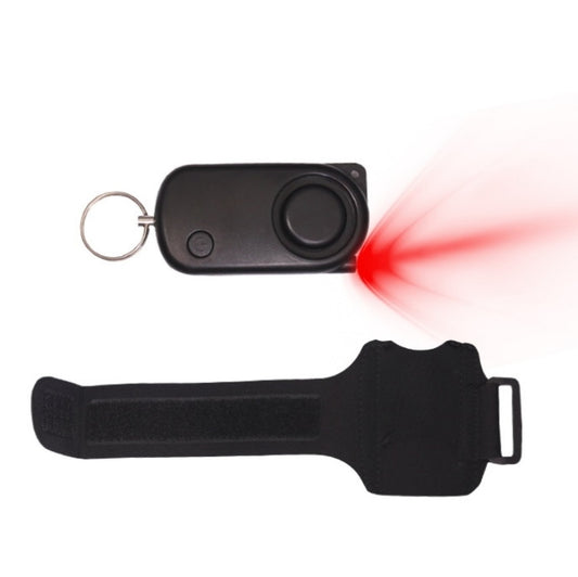 Black personal safety alarm with wrist strap and keychain ring, round siren button.