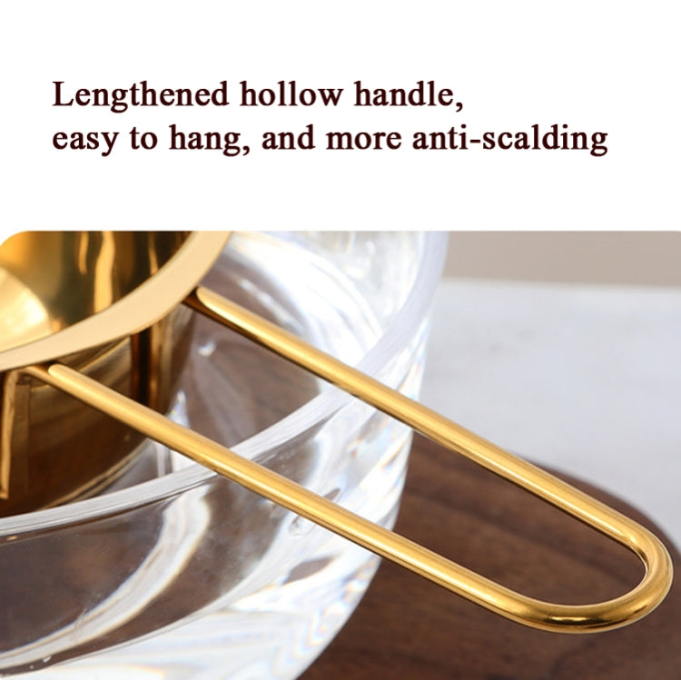 Gold stainless steel melting bowl with long curved hollow handle and side loop grips