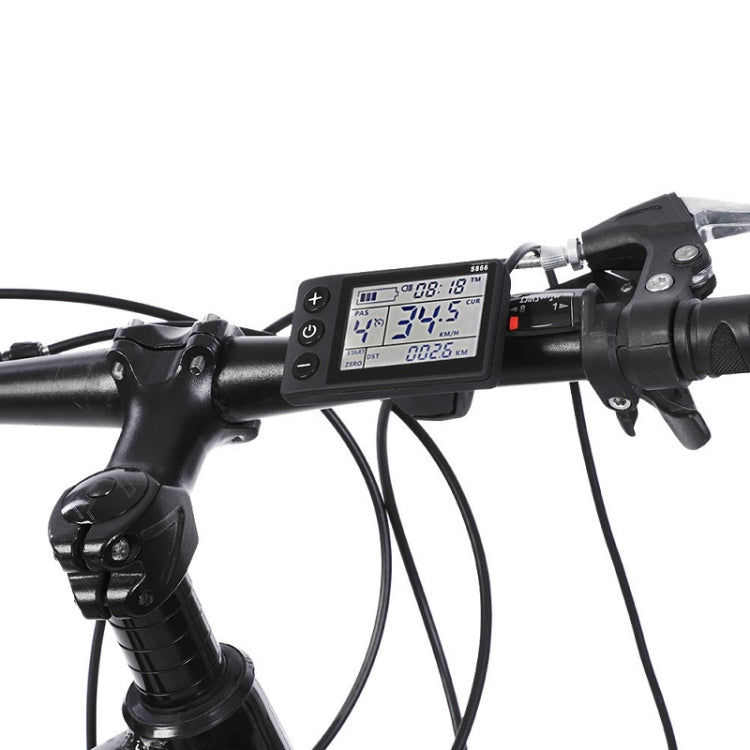 Electric bicycle LCD dashboard display on handlebar with buttons and wiring