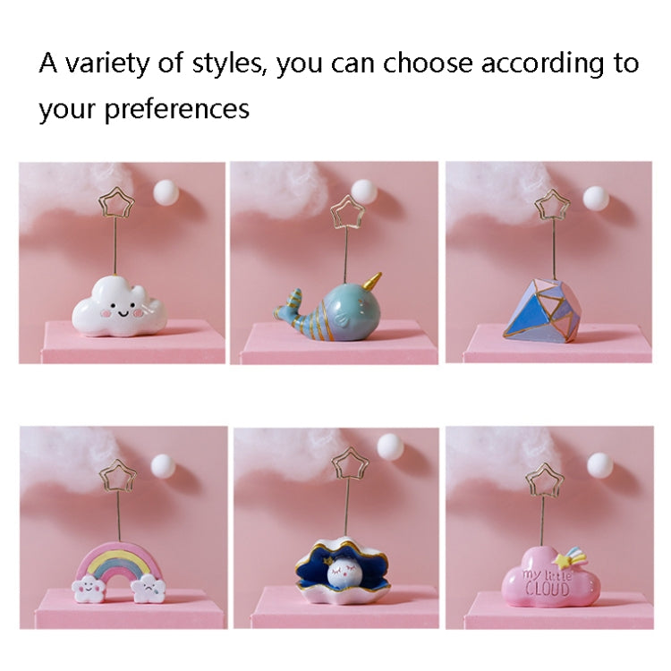 Assorted cute resin photo clip designs on display, including a cloud base