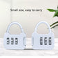 Pair of mini digital password padlocks, white bodies with arched shackles and 3-number dials