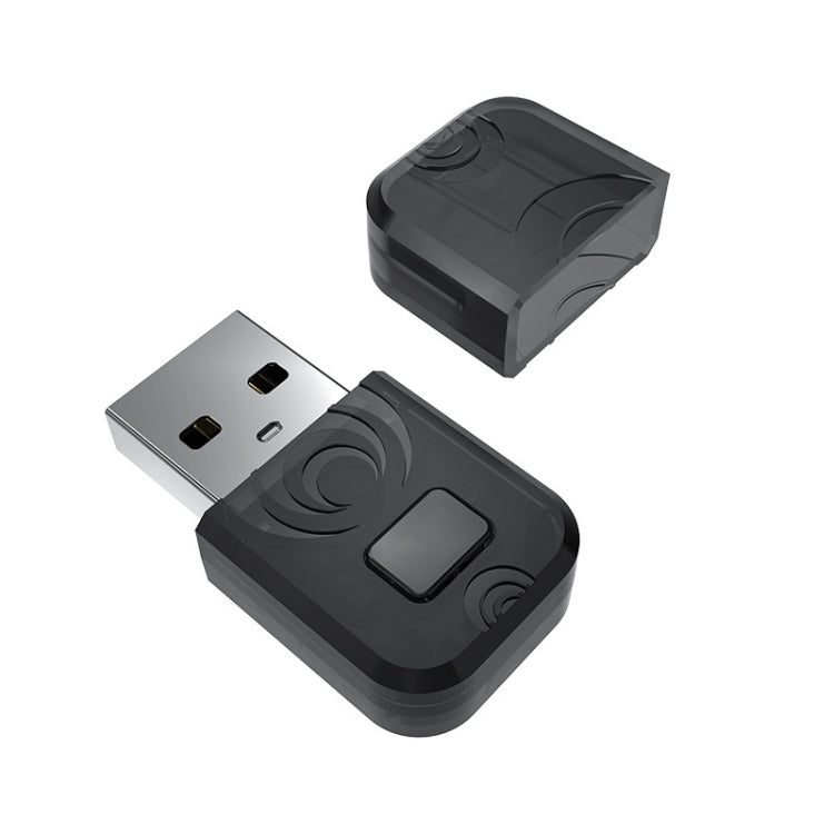 Black Bluetooth audio transmitter USB adapter from top angle with plug and indicator window