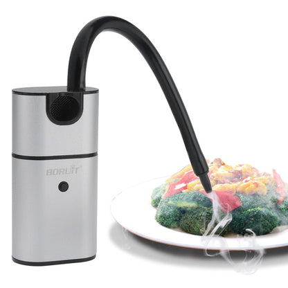 Handheld smoking tool with silver body and black curved exhaust hose