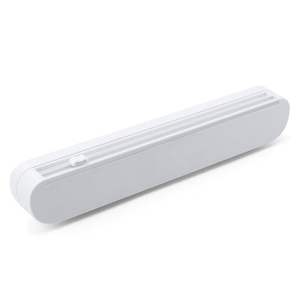 White suction cup cling film cutter with built-in cutting bar