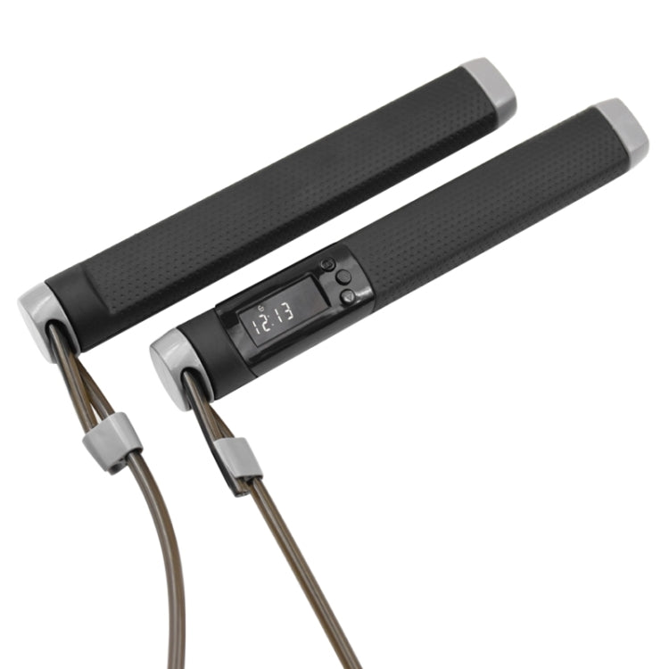 Electronic skipping rope with black grip handles and digital calorie counter display