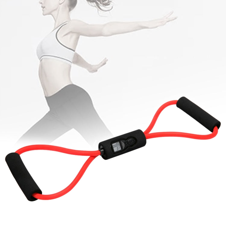 Digital resistance exercise band with red cord and black foam handles, chest LCD unit